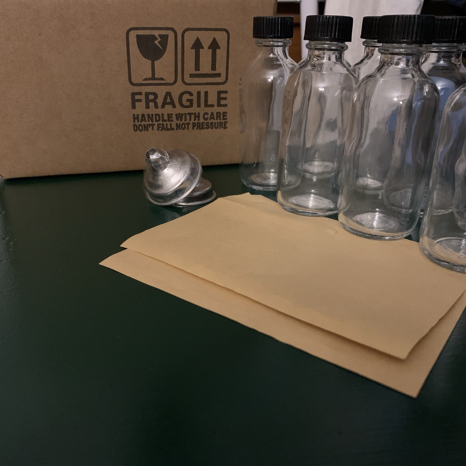8 Pack, 2 oz Small Clear Glass Bottles w/ Lid & 2 Stainless Steel Funnels - 60ml
