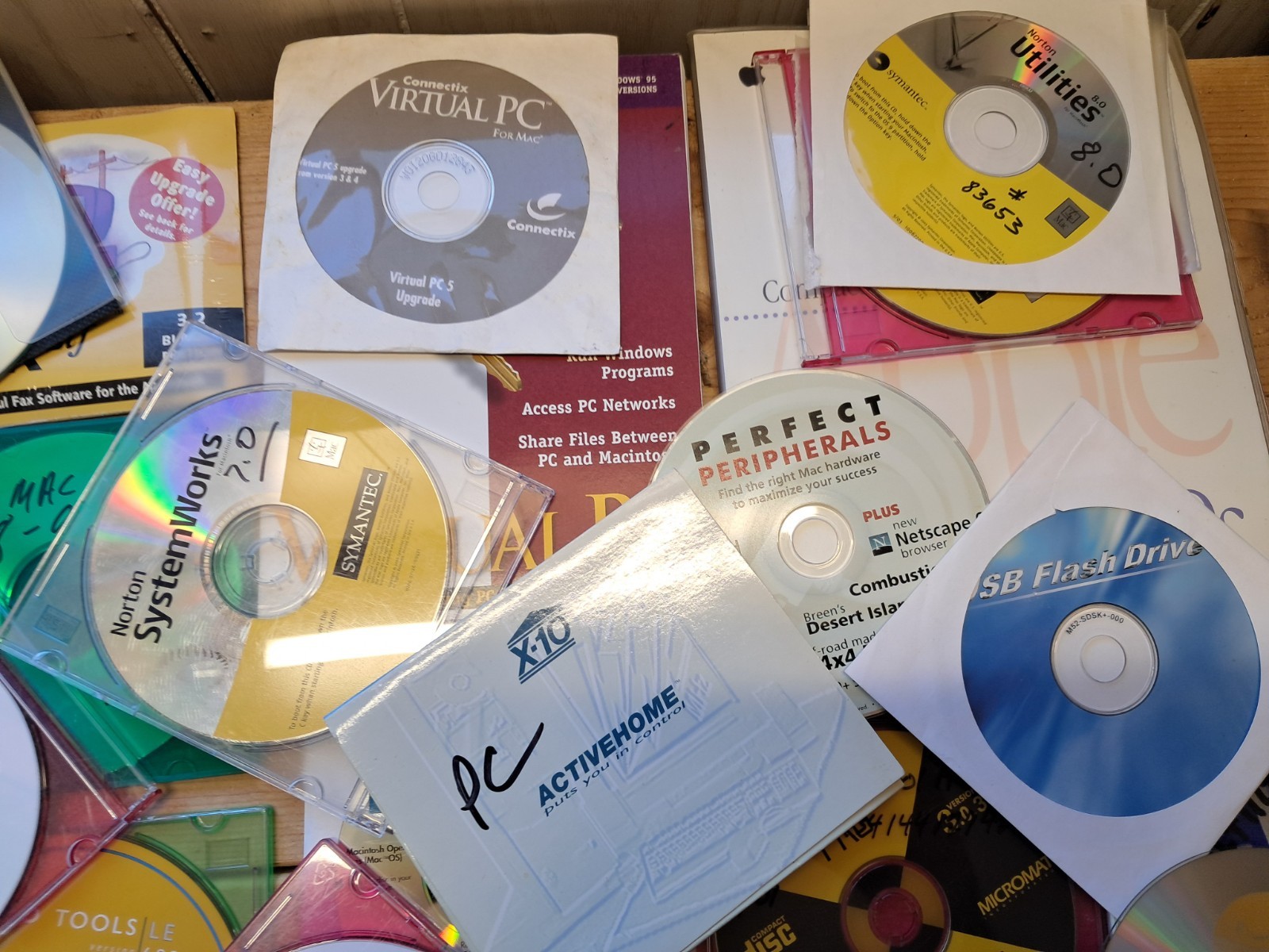40 assorted vintage Mac CD Roms. Mostly from the Power Mac Era.