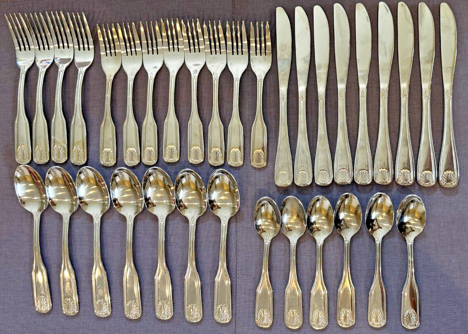 New Star Foodservice Shell Pattern Stainless Flatware 34-Piece Flatware Set