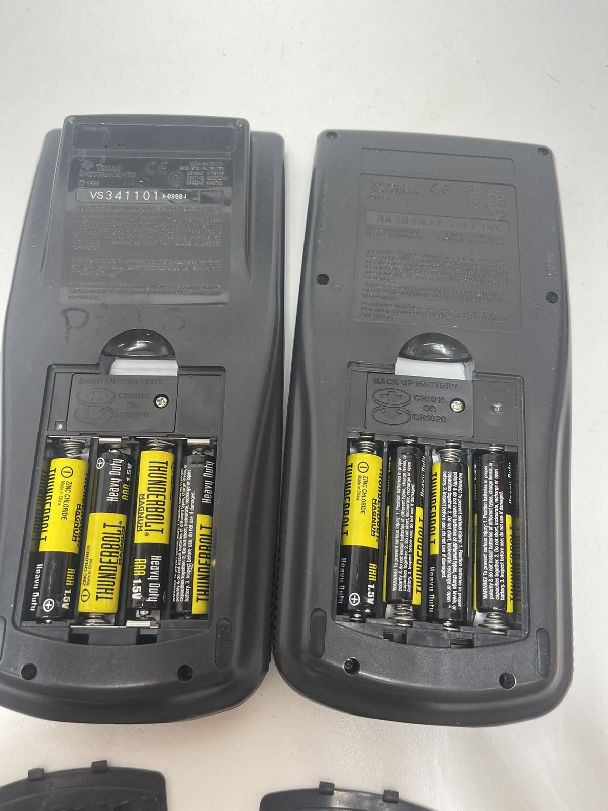 2 Texas Instruments TI-83 Graphing Calculators With Covers