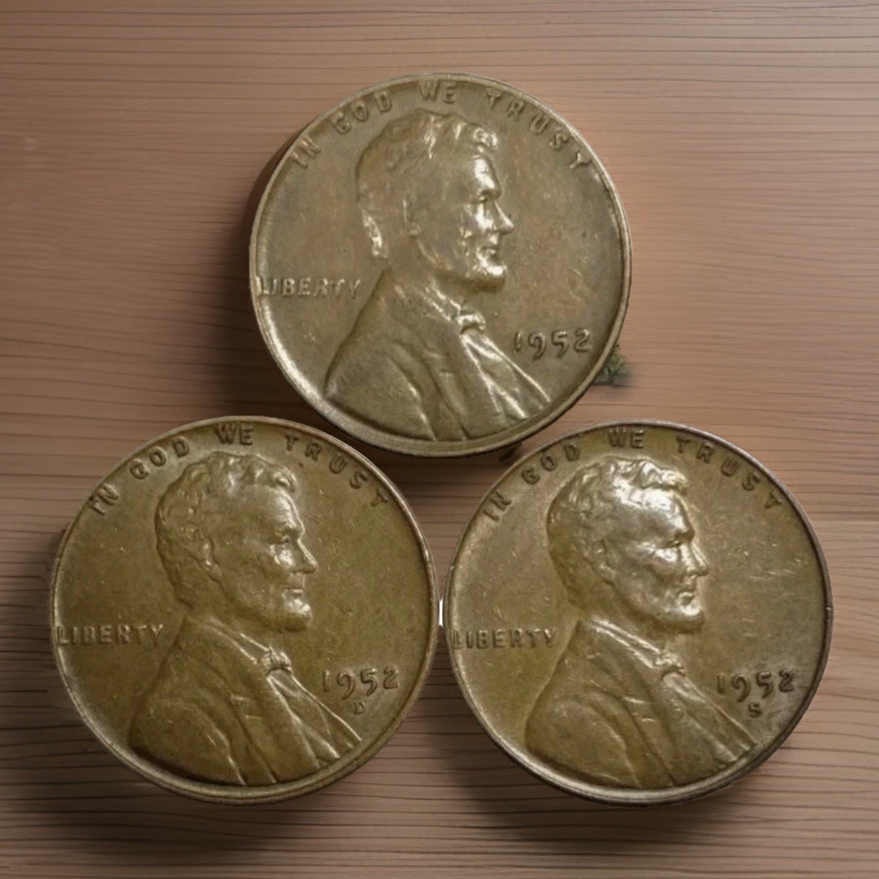 1952 P D S Lincoln Wheat Cents (3) Coins—These coins are average circulated
