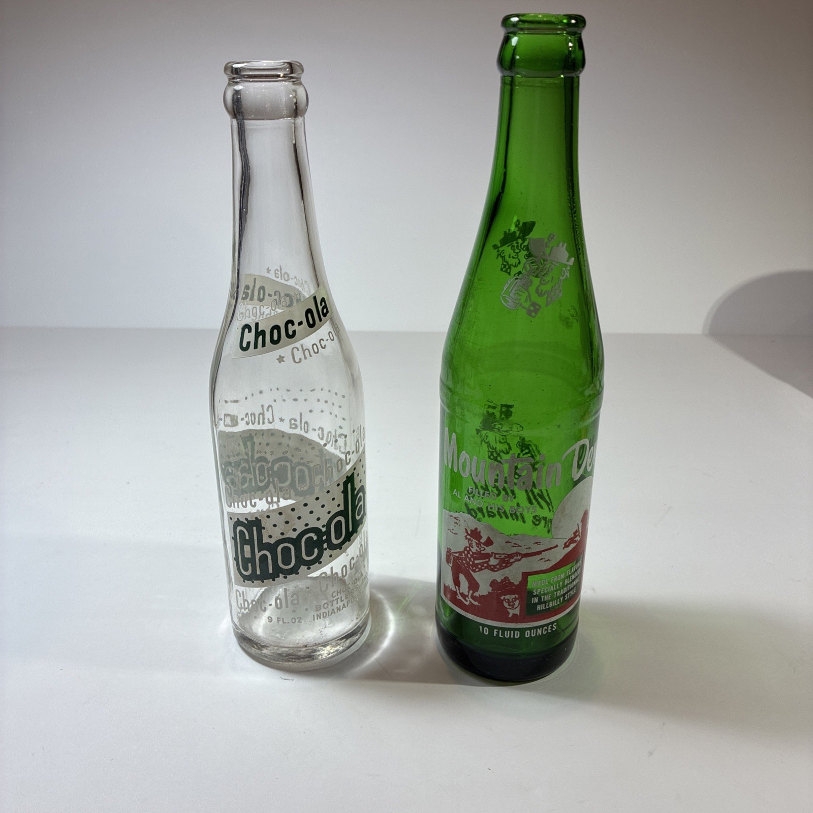 Vintage Mountain Dew And Choc-Cola Bottle