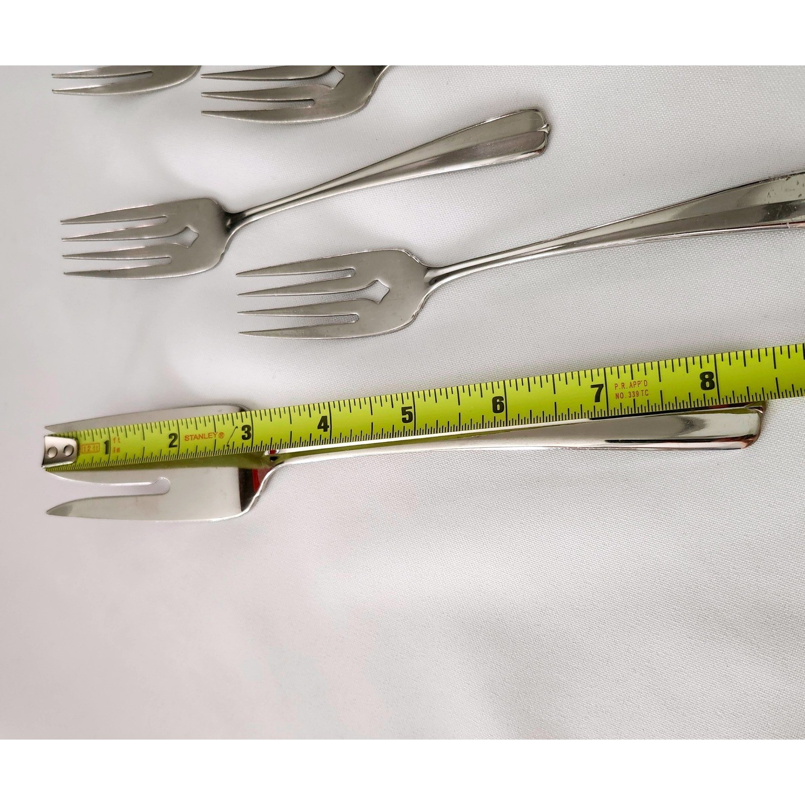 7 -ONEIDA USA GALA IMPULSE PATTERN GLOSSY STAINLESS SALAD FORKS & 1 Serving Fork