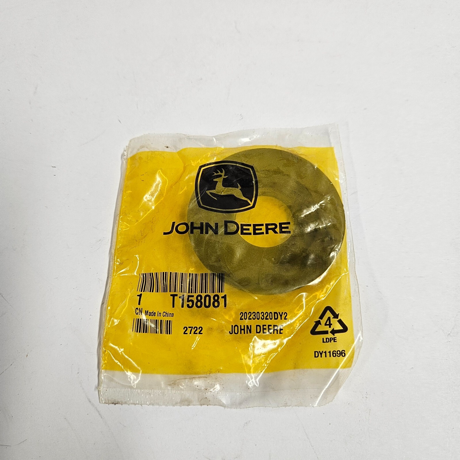 JOHN DEERE WASHER # T158081 John Deere Non Metallic Shoulder Washer with 7 mm
