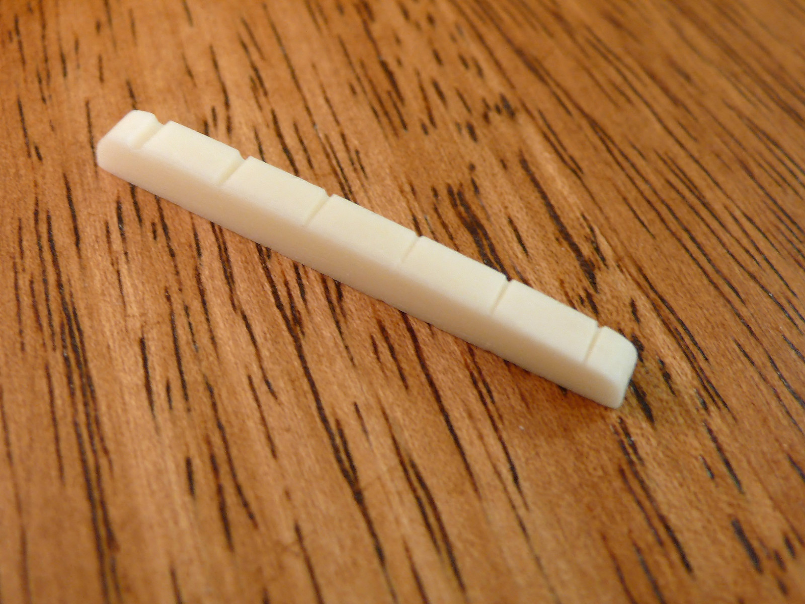 GUITAR NUT BONE 42MM SLOTTED FOR STRATOCASTER TELECASTER