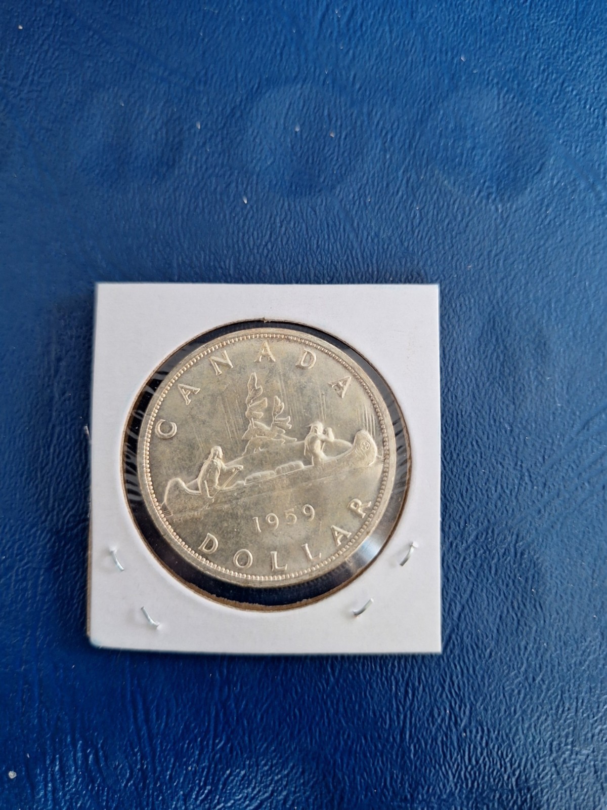 1959 CANADIAN SILVER DOLLAR ELIZABETH II  LIGHTLY CIRCULATED. LIKE UNCIRCULATED