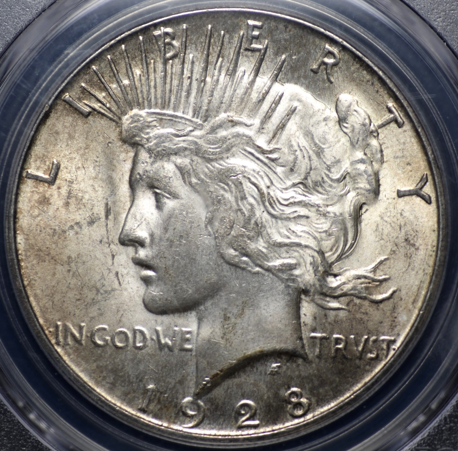 1928 S PEACE DOLLAR PCGS CHOICE MS 63 LIGHT GREYING SILVER AND GOLDEN OLIVE