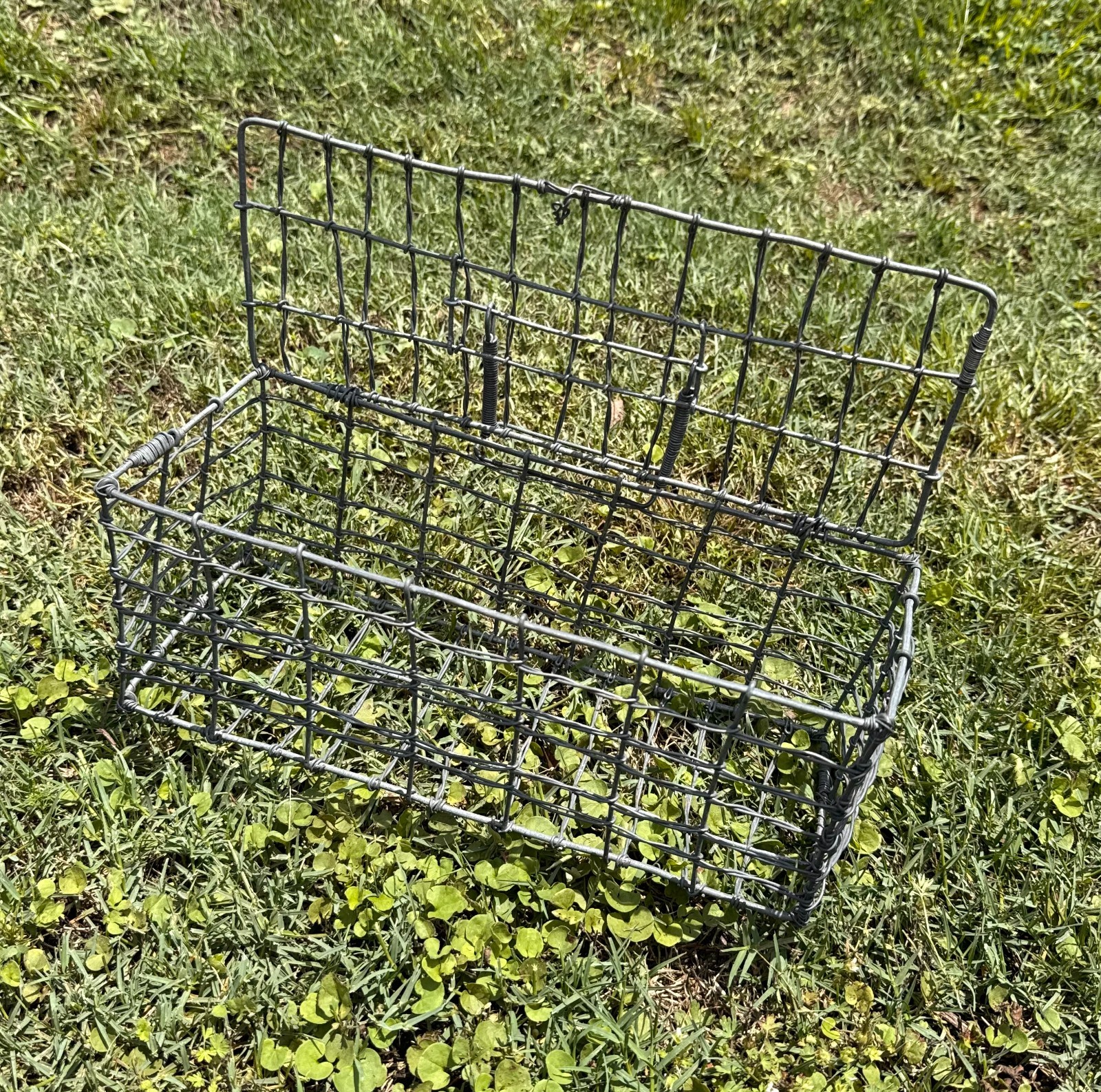 small rectangular wire baskerbasket with attached lid and clasp graden or home