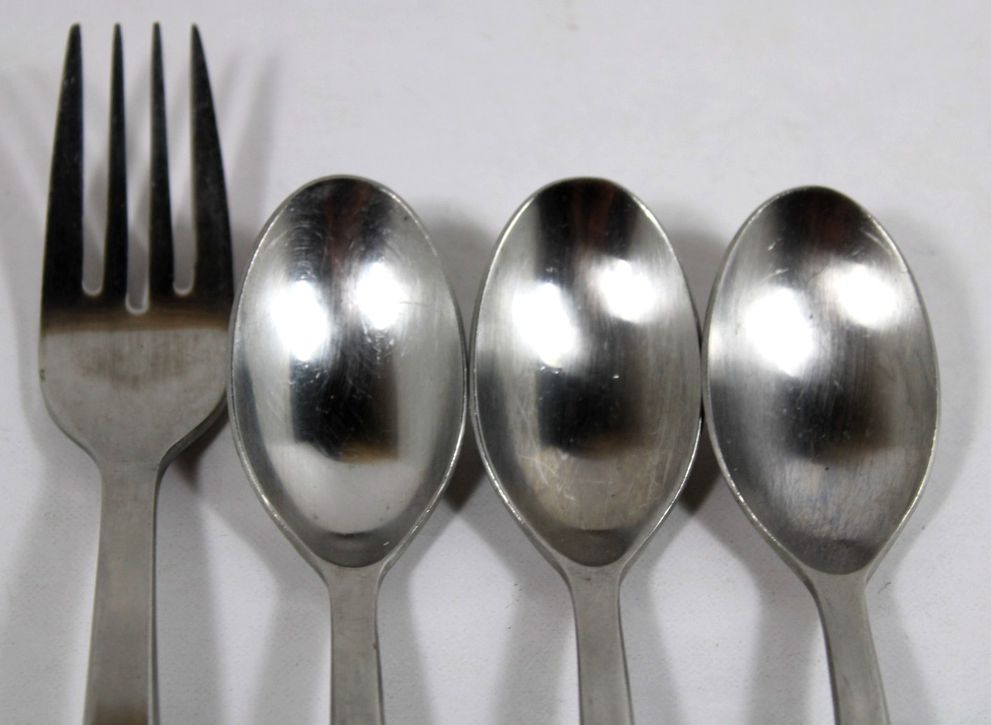 4 Pce. Gourmet Settings Jazz Stainless Flatware - 3 Teaspoons, 1 Dinner Fork