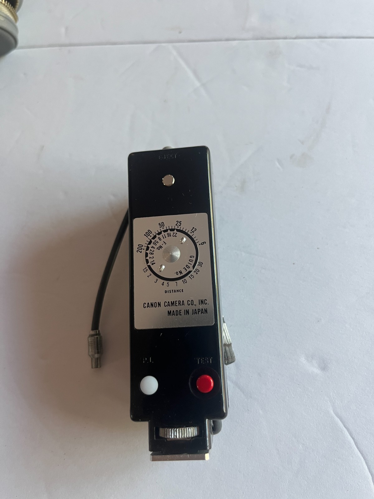 Vintage 1970s Canon Camera Flash attachment with collapsible light reflector