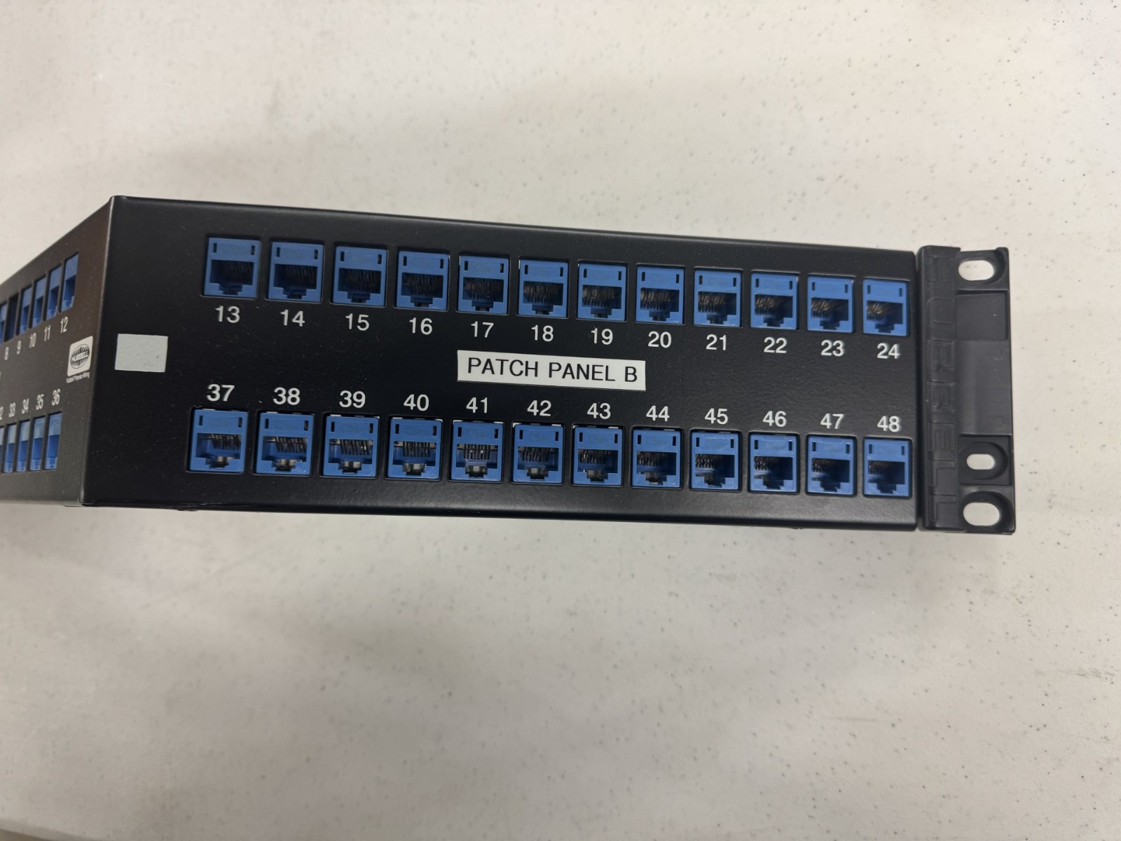 USED HUBBELL UDXA48 48 PORT ANGLED PATCH PANEL LOADED WITH CAT 5e JACKS!