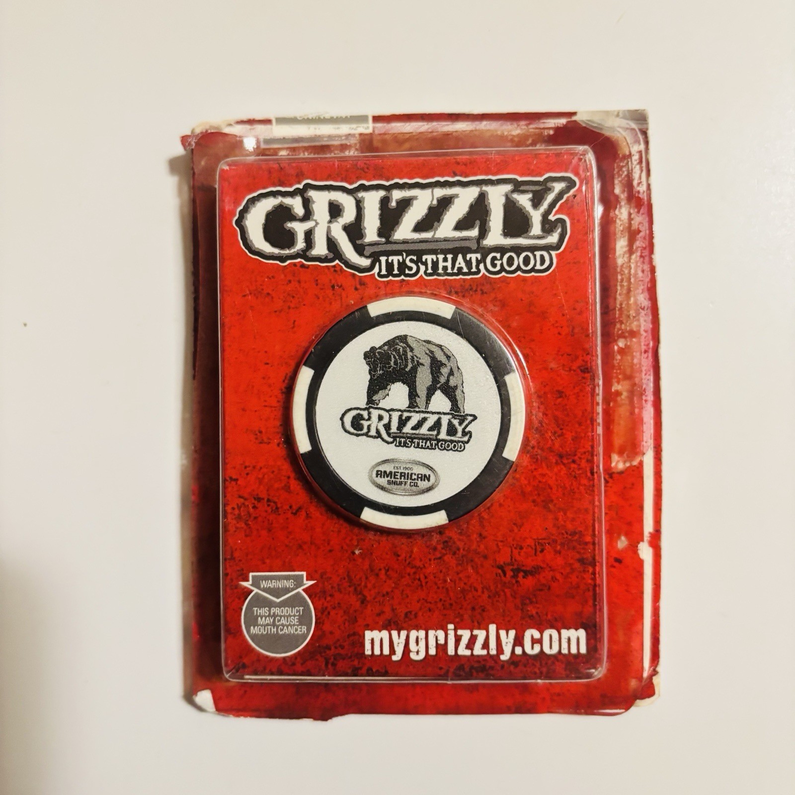 Vintage Grizzly Playing Cards and a Grizzly Chip.  Cards Sealed.