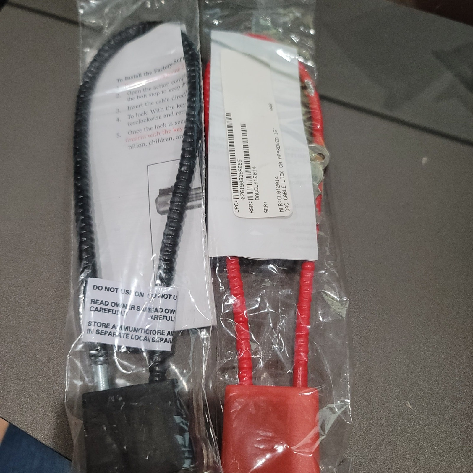 Set of 2 red and black Gun Locks unbranded.  Brand New
