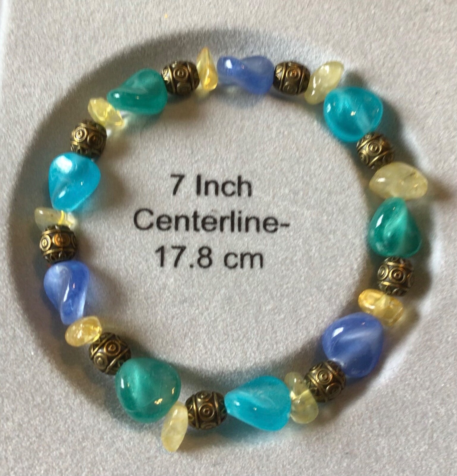 7” stretch bracelet, multicolored w/gold colored accents, Made in the USA