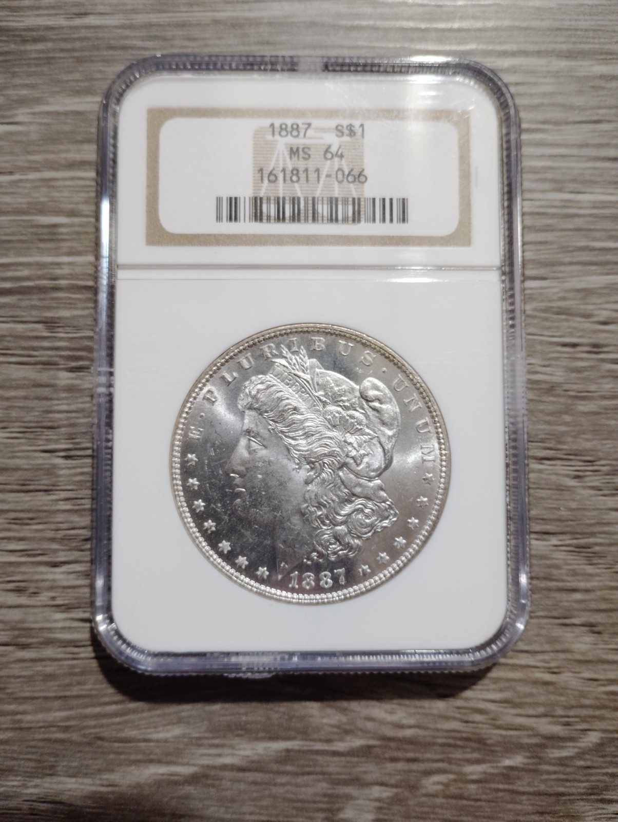 1887-P NGC MS64 Morgan Silver Dollar