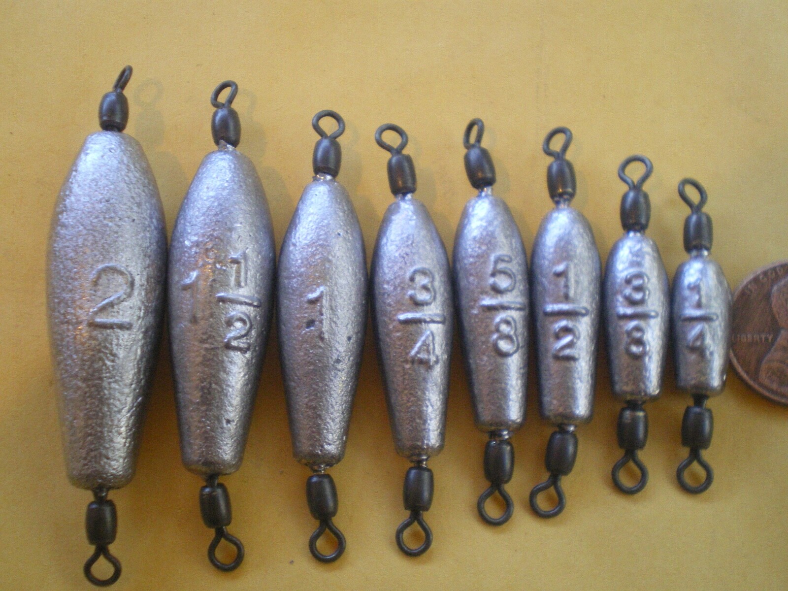 7 PCS. TROLLING SINKER W/#7 BLACK CRANE SWIVEL, 1 OZ.