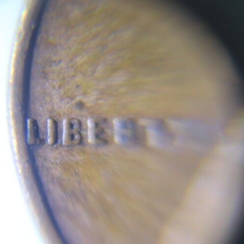 1944 S penny, error "L" in LIBERTY on rim