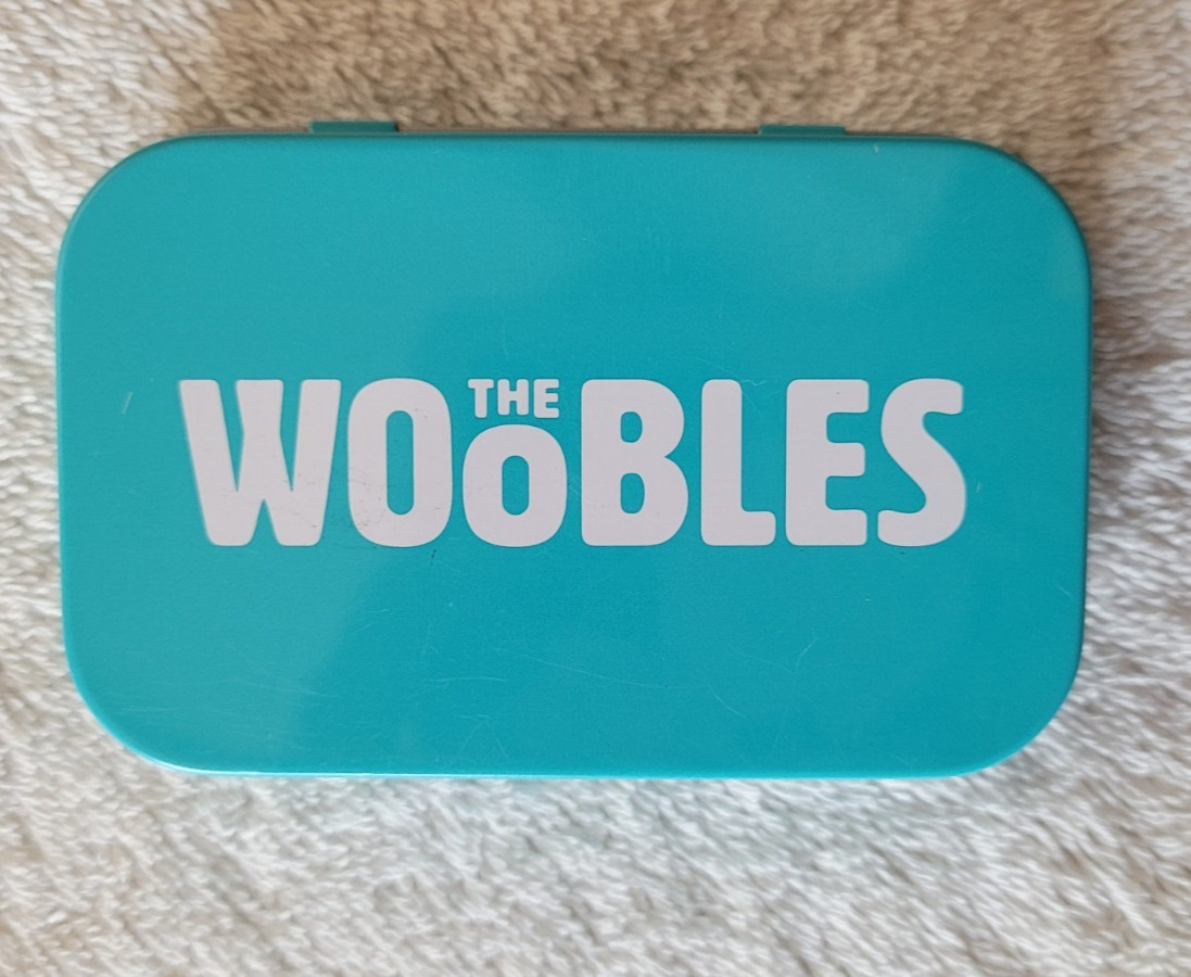 Preowned Wooble Wee Woobly Bits Tin