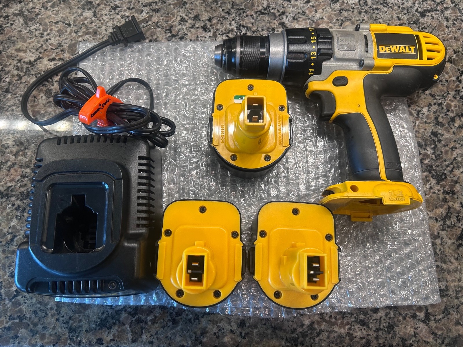 Dewalt XRP Drill/ Driver with 3 batteries (2 brand new), Charger and case.