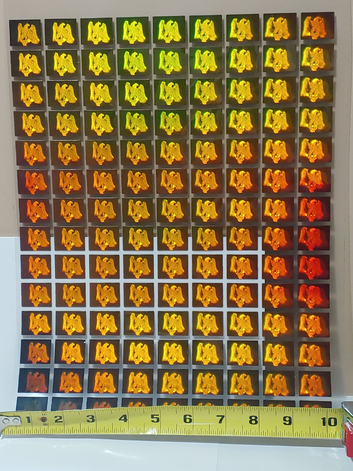 Uncut Eagle Hologram Sheet - 126 Polaroid Holograms 1” X 7/8”
