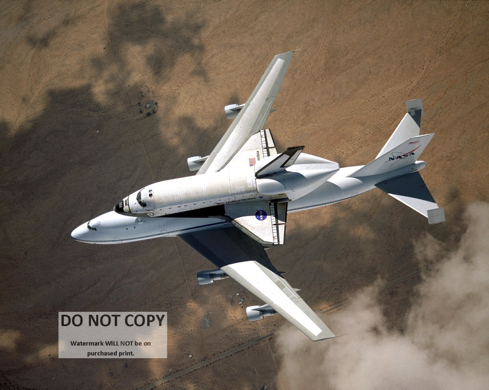 SPACE SHUTTLE COLUMBIA ON CARRIER AIRCRAFT TO KSC - 8X10 NASA PHOTO (EP-406)