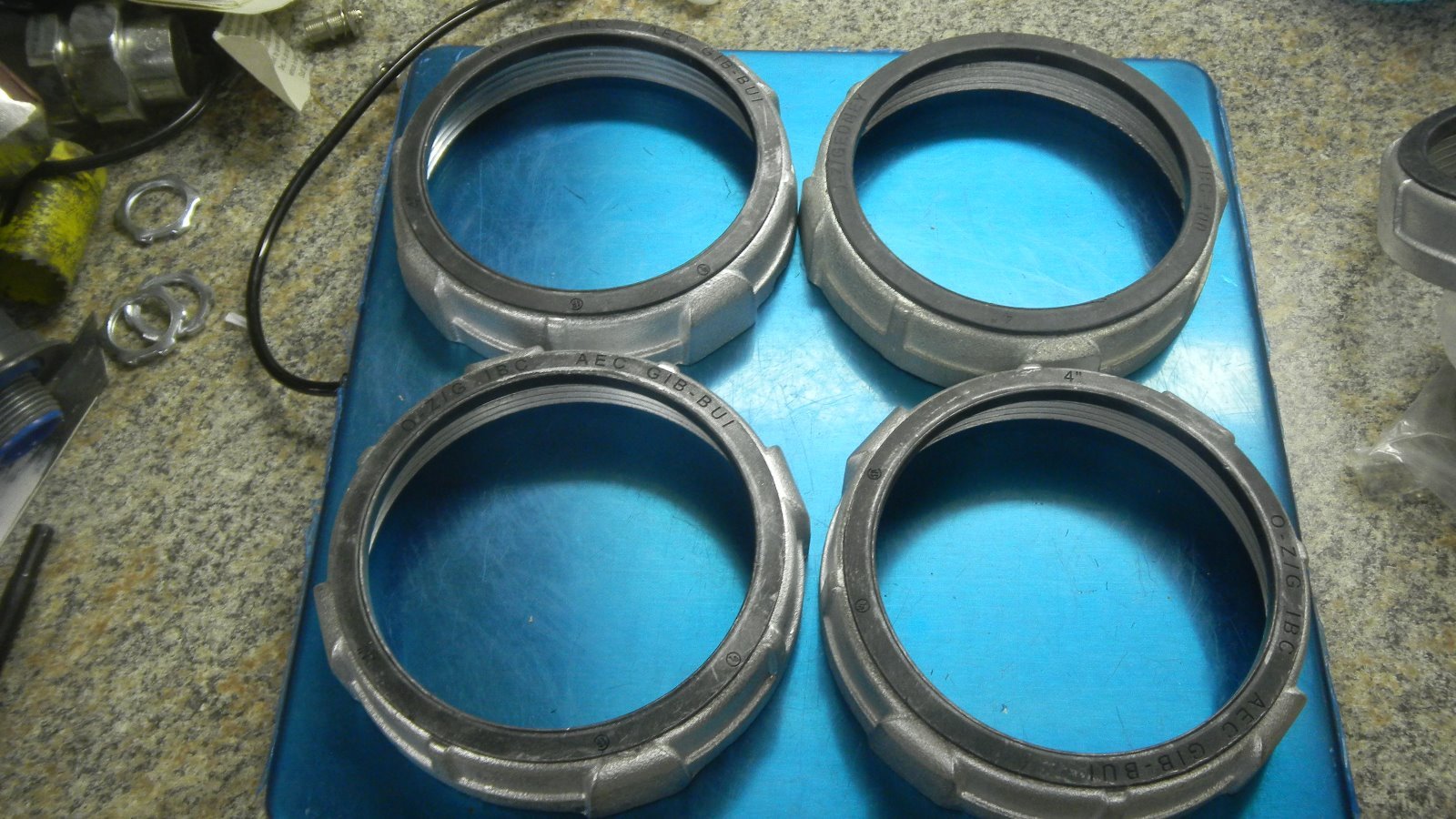 NEW OZ 4IN. MALLEABLE IRON INSULATED BUSHINGS  LOT OF 2