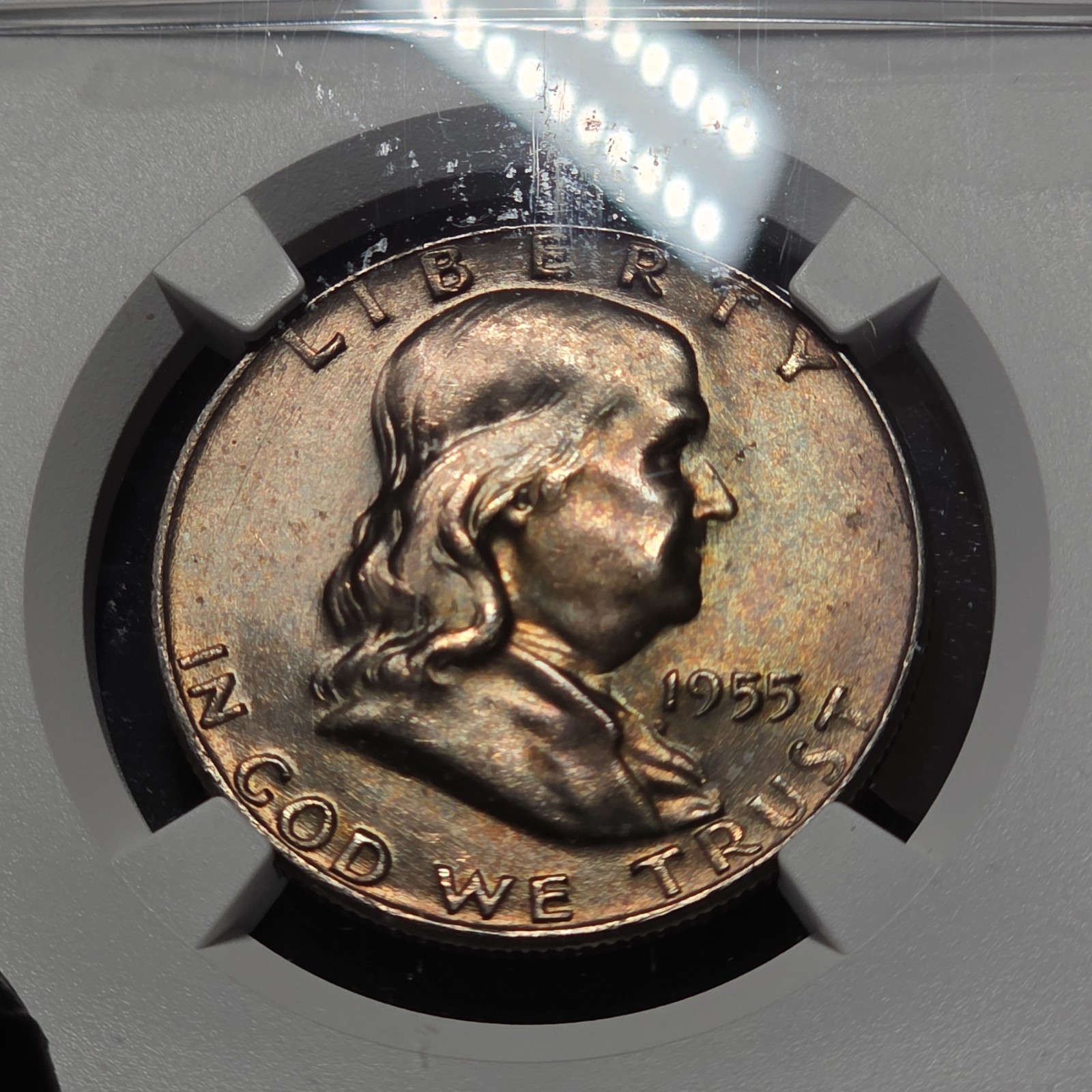 1955 Franklin Silver Half Dollar NGC MS65 Bugs Bunny Variety Toned Coin