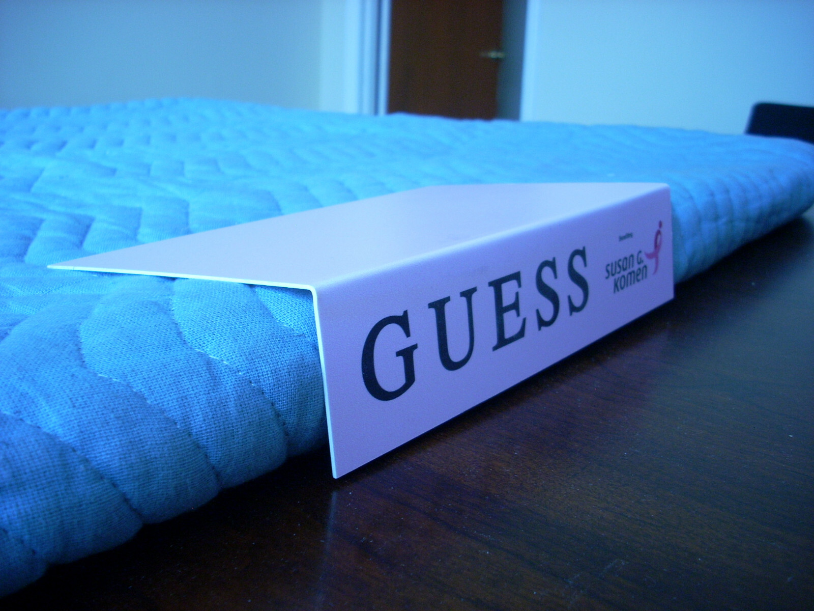 GUESS ADVERTISING SHELF/ TABLE END INSERT PROMOTING SUSAN G. KOMEN FOUNDATION