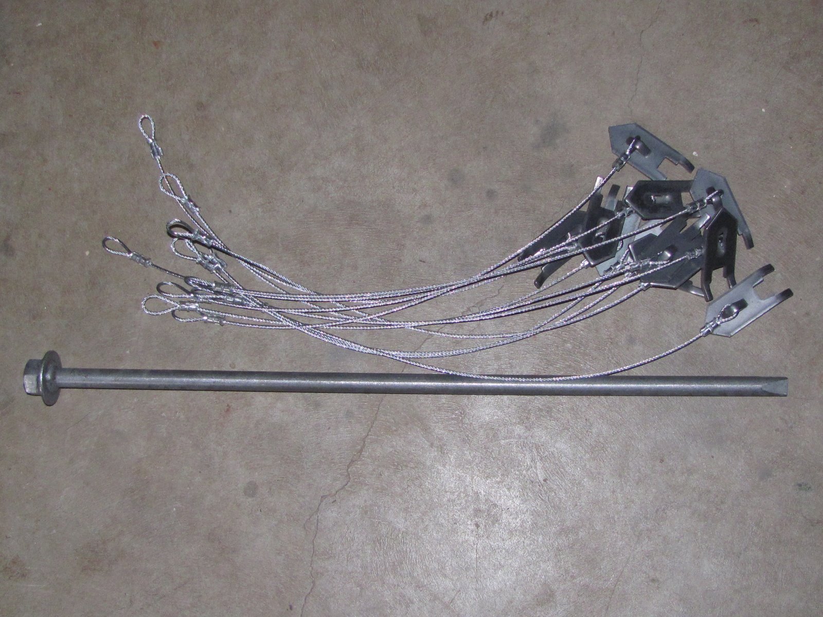 1 Dozen WOLF FANG ANCHORS w/ 18" CABLE & DRIVER, trapping stakes, traps, coyote