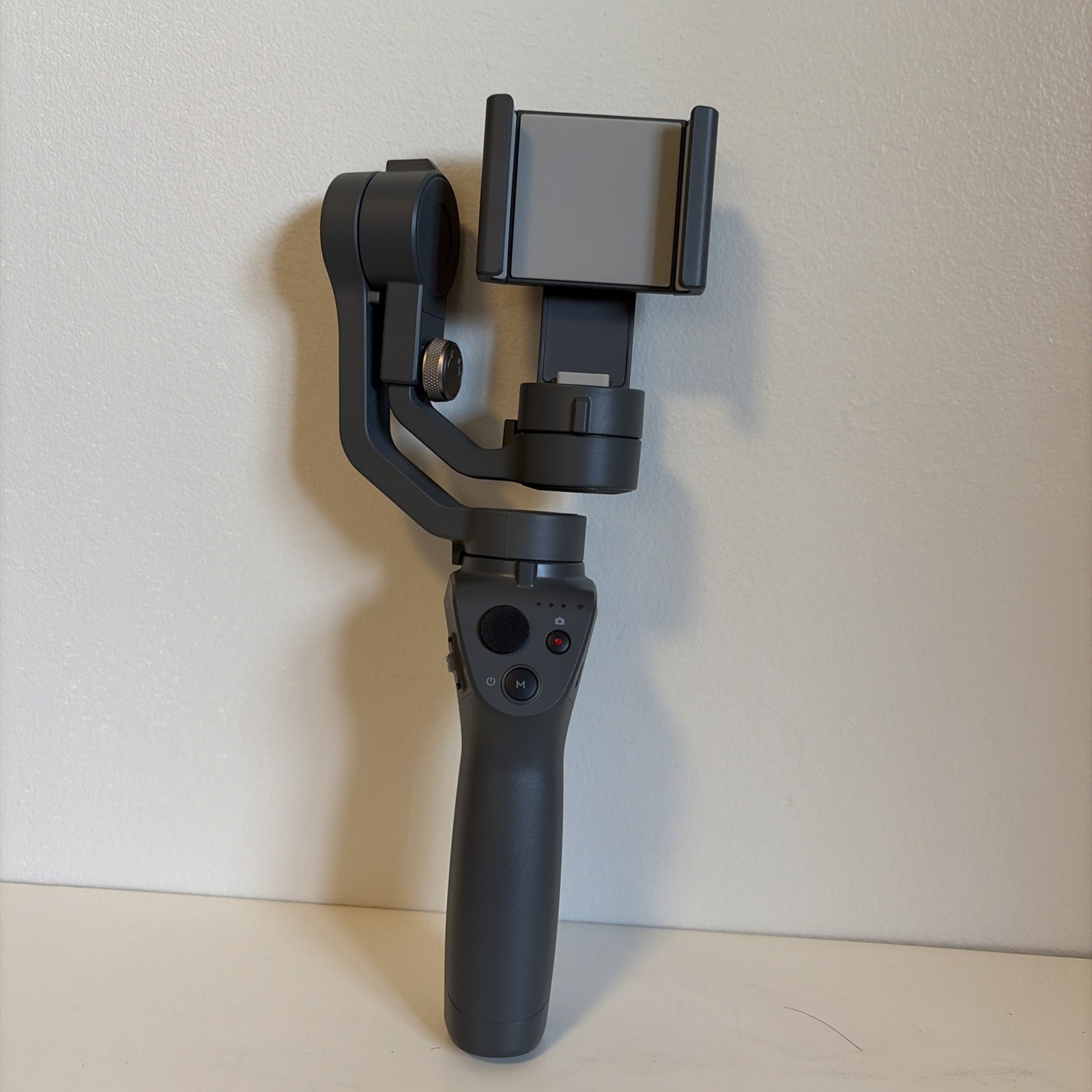 DJI Osmo Mobile 2 Gimbal Hand Stabilizer for Smartphones - Gimbal Only No Cords