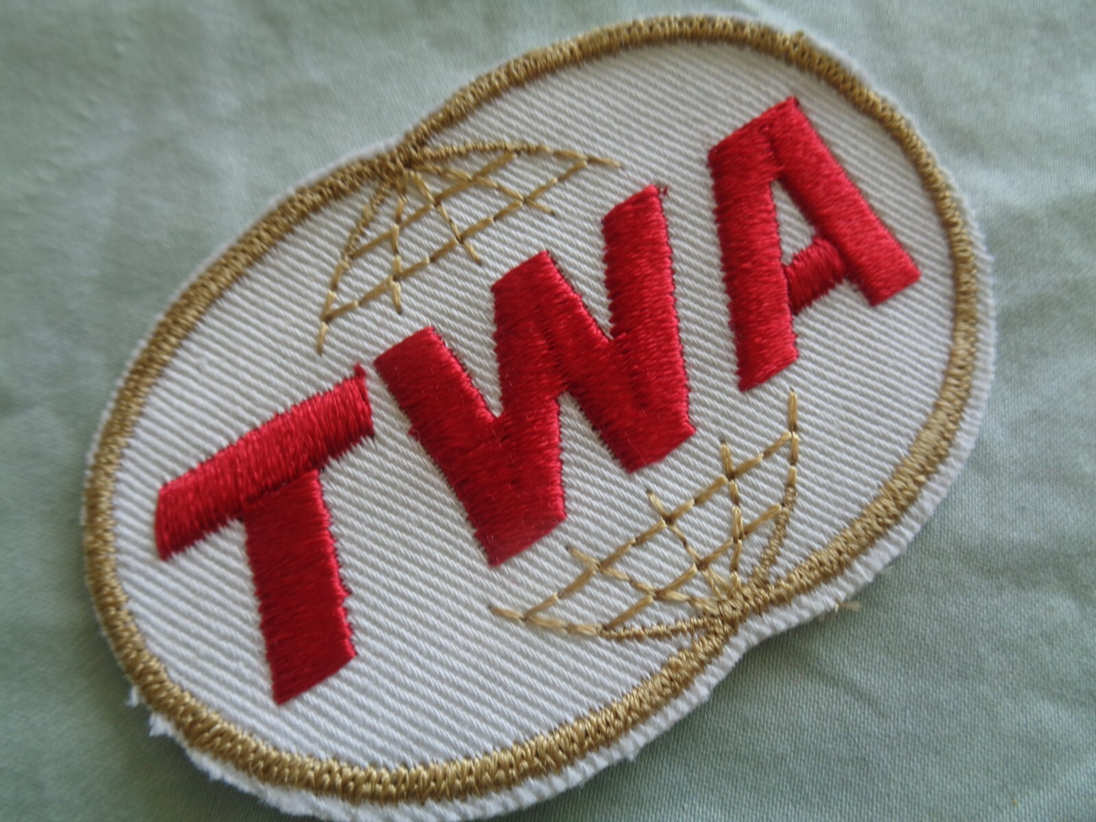 TWA AIRLINES UNIFORM PATCH - 3 X 2 INCHES NEW! ORIGINAL VINTAGE! COOL