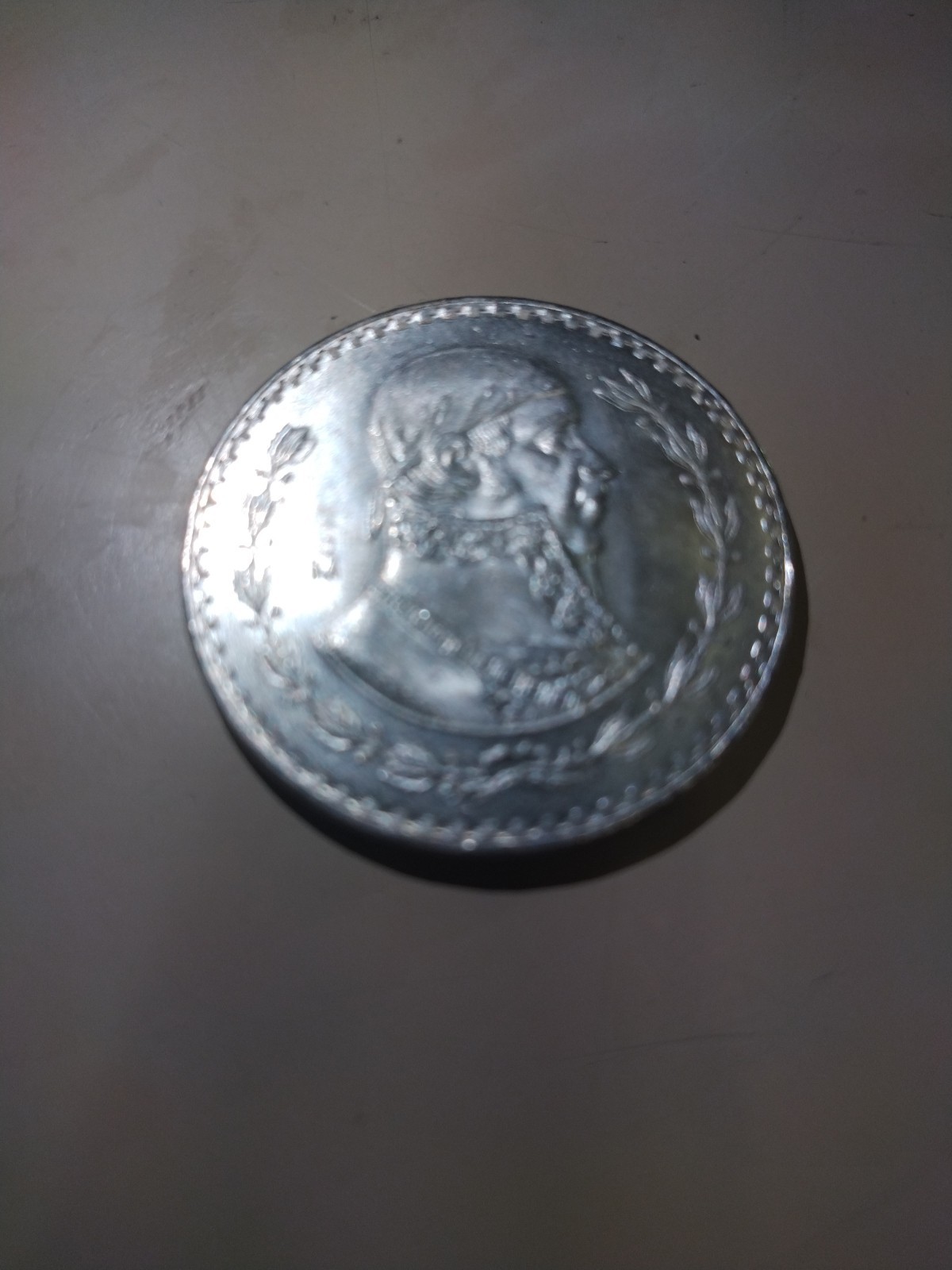 This Is A Mexican Coin That Is From 1965 Silver Mexican Peso