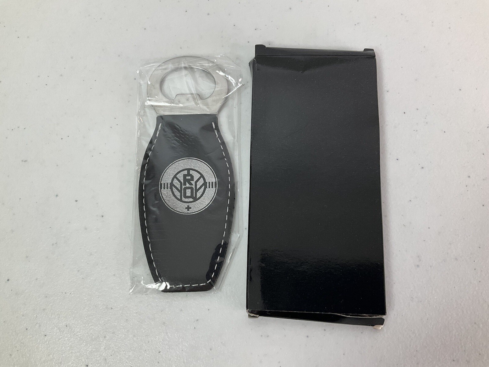 RefQuest Plus (RQ+ ) Black Leather Magnetic Bottle Opener. NEW.