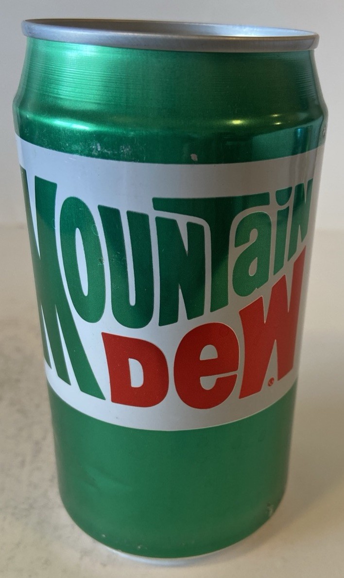 12oz. MTN DEW SODA CAN ( TICKET TO ROCK )EMPTY BOTTOM OPENED