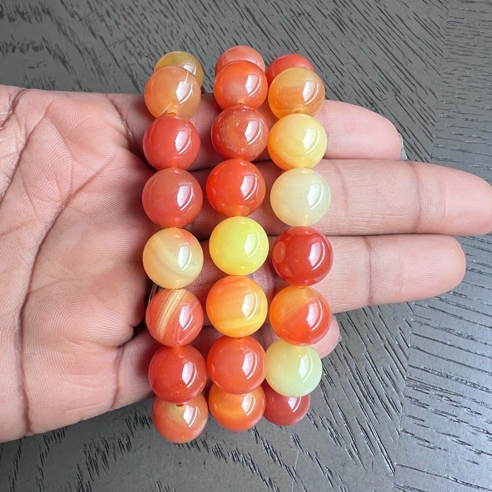Orange agate bracelet 12mm 6.5’ (one)