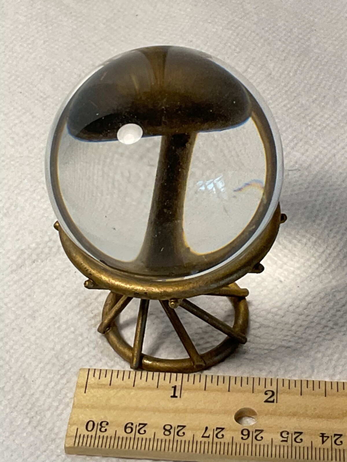 Clear round glass globe on brass stand 2”