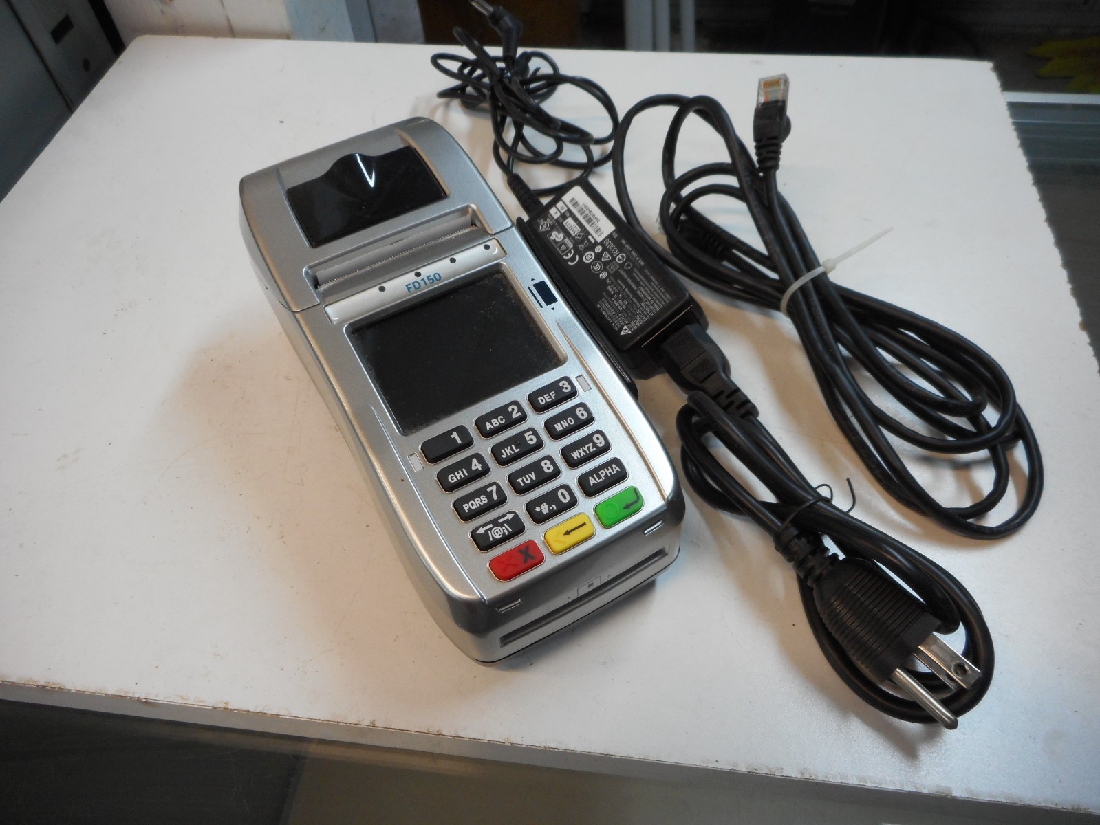 First Data FD150 EMV CTLS Credit Card Terminal with 6 Extra Rolls of Paper
