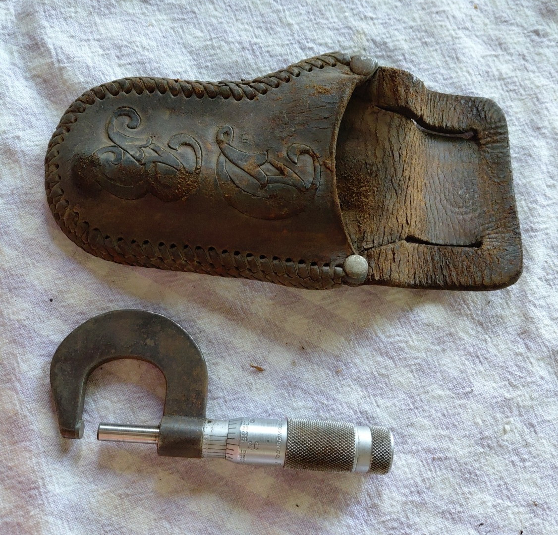 brown sharp micrometer and leather pouch