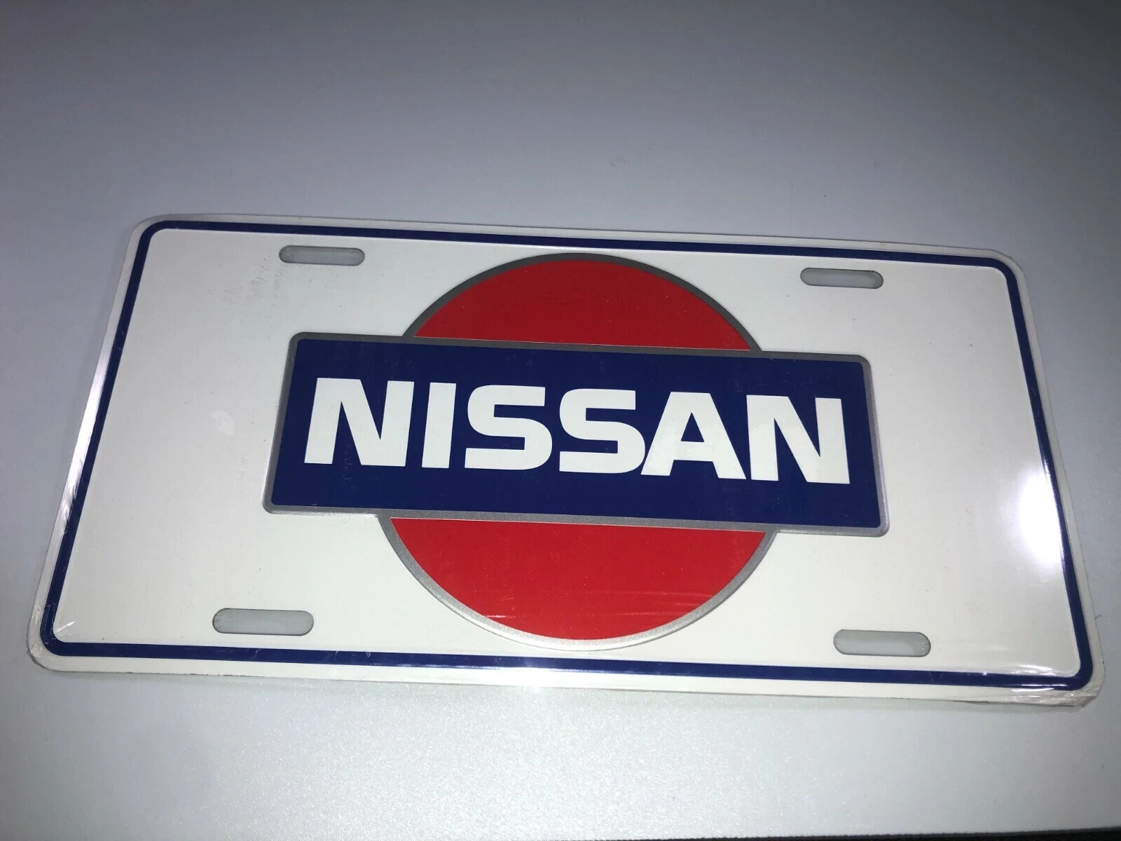 Fits Nissan Embossed Auto License Plate Standard Size: 11.75" wide x 6"