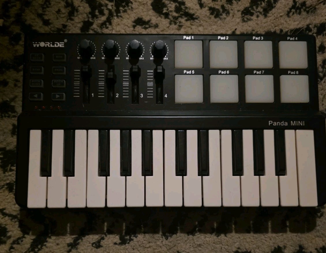 Worlde Panda Mini 25-Key USB Keyboard and Drum Pad MIDI Controller