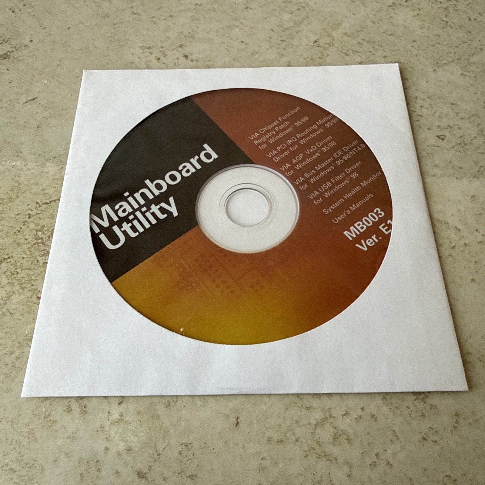 VIA Mainboard Utility and User's Guide CD MB003 Ver. E.3.1 CD-ROM Disc Windows