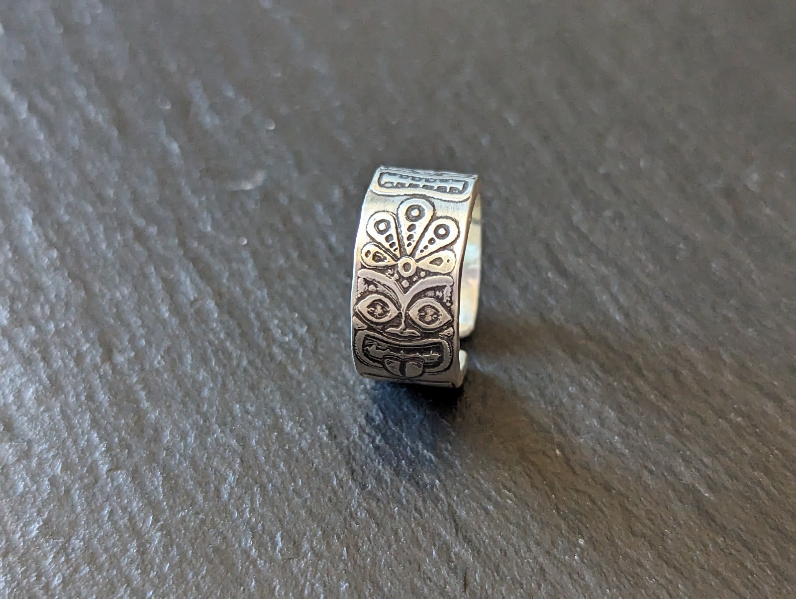 Thick sterling silver ring with tiki gods - handmade - open design
