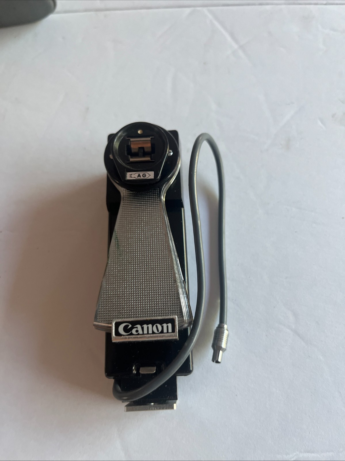 Vintage 1970s Canon Camera Flash attachment with collapsible light reflector