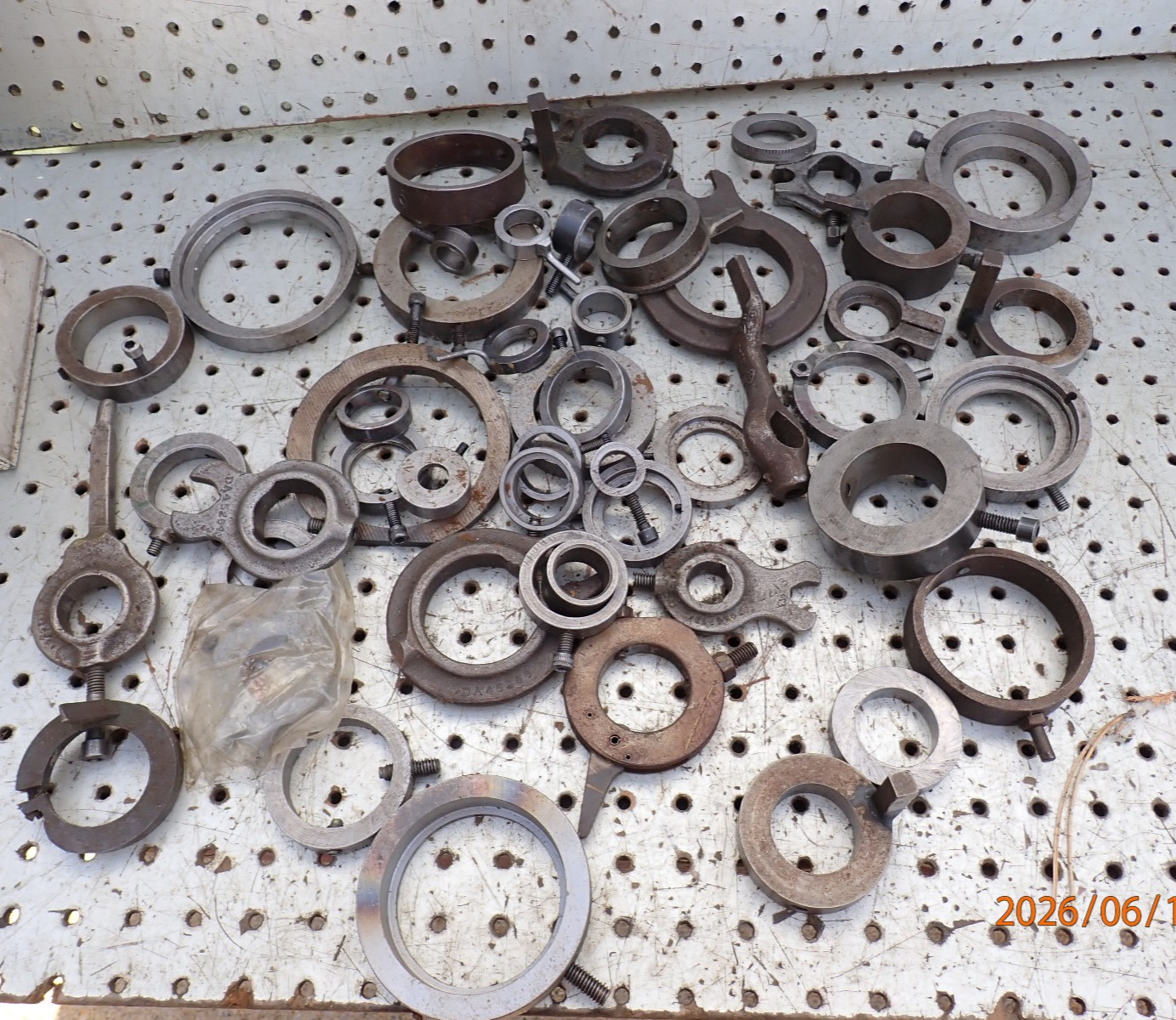 LOT AM175: PILE OF MACHINIST MADE AND OTHER  GRINDING GRINDER DRIVE DOGS DAWGS