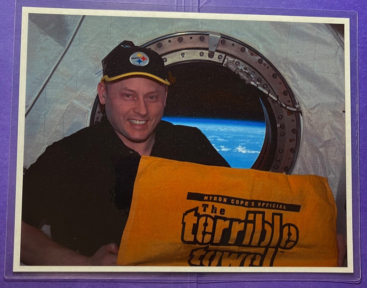 NASA ASTRONAUT ON ISS HOLDING A PITTSBURGH STEELERS TERRIBLE TOWEL LAMINATED