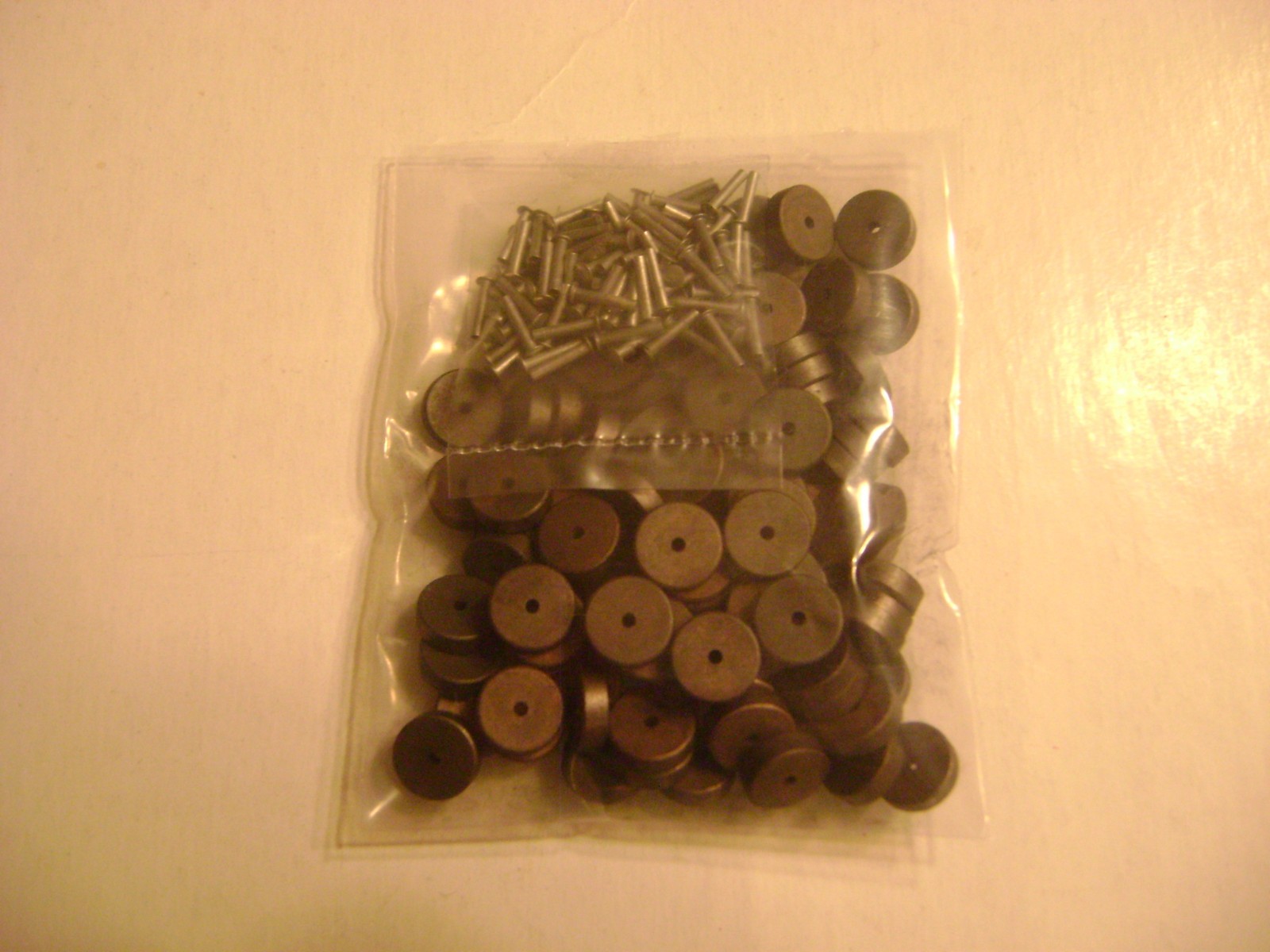 Lionel V-45 Carbon Roller & ZW-102 Pin (pkg. of 100 of each)