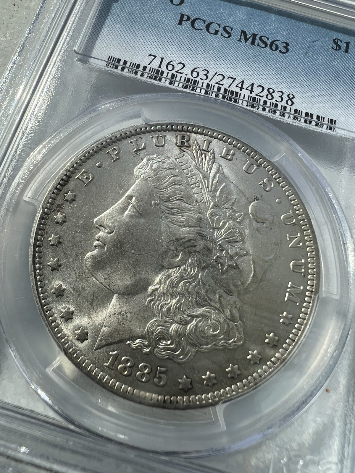 1885-O Morgan Silver $1 Dollar PCGS MS 63