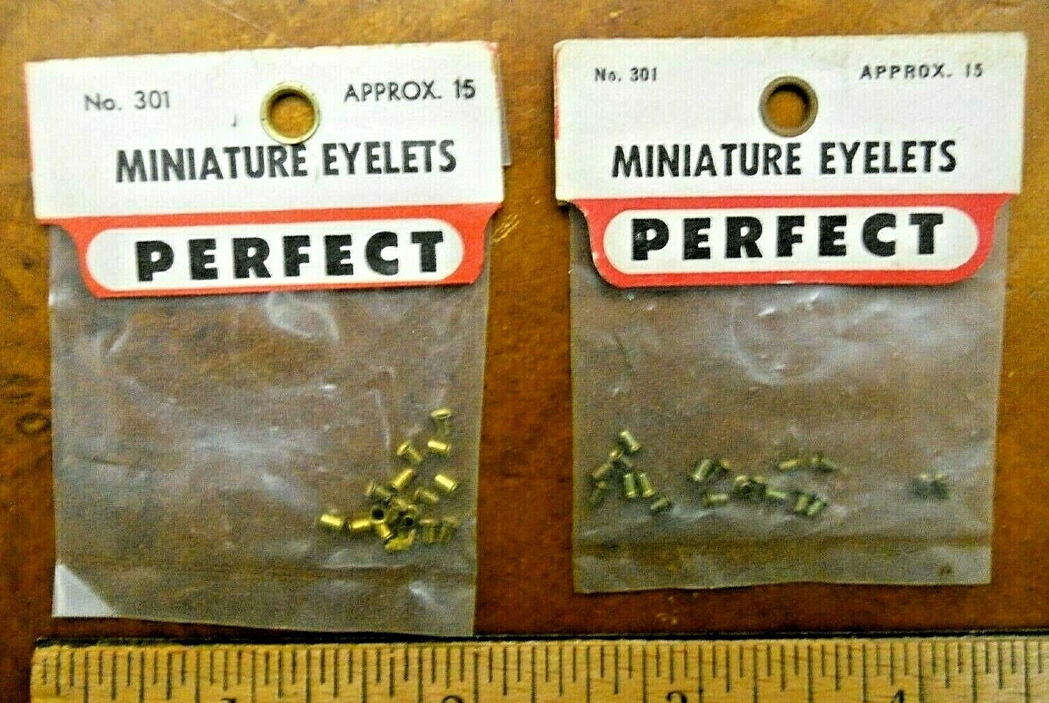 PERFECT MODEL AIRPLANE PARTS #301 MINATURE EYELETS (2 PACKS) (NEW OLD STOCK)
