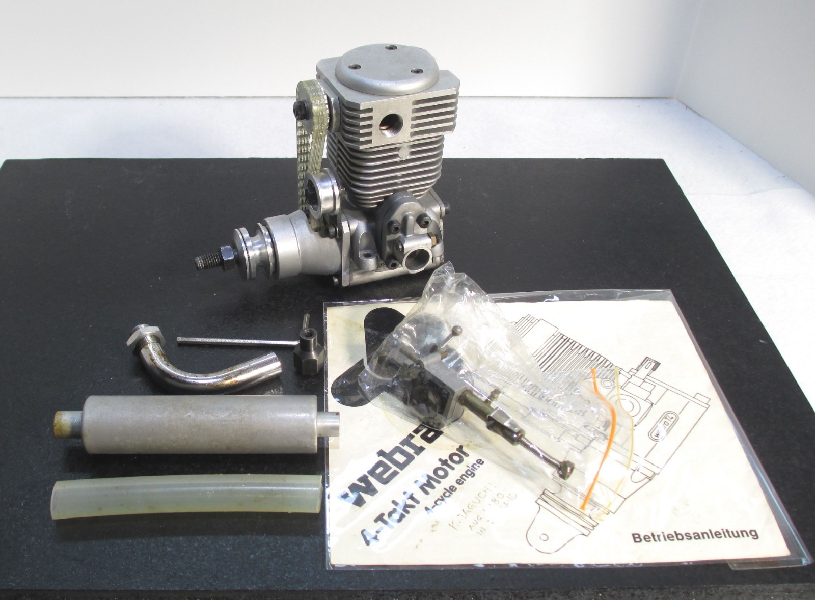 Webra T4 15cc 4 cycle glow engine with muffler, used for R/C airplane