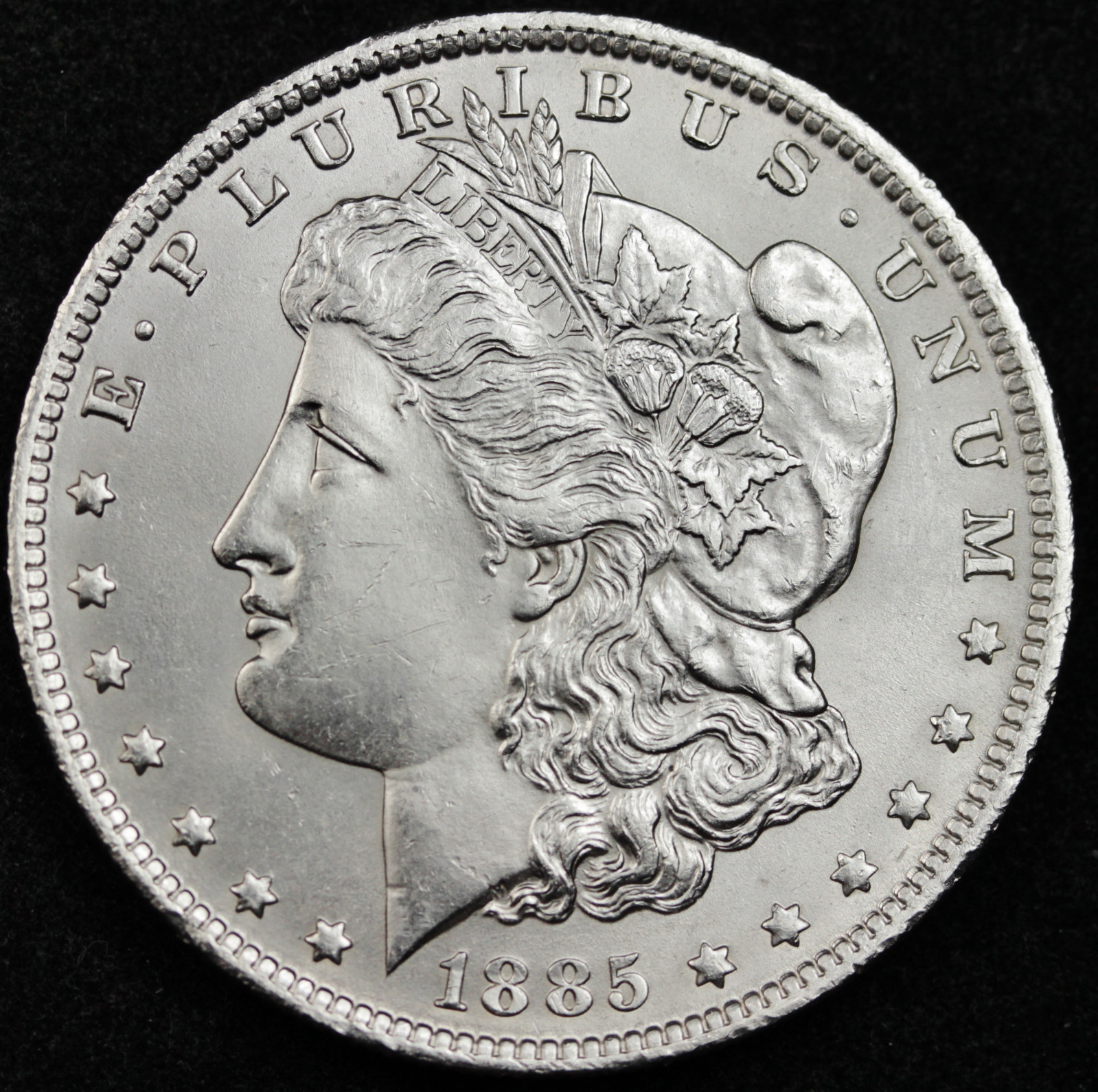 1885-o Morgan Silver Dollar.  Full Chest Feathers.  B.U.   (Inventory A)